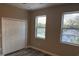 Bright bedroom with hardwood floors and a closet for storage at 2404 Cassell St, Tampa, FL 33605