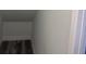 Interior shot of closet with white walls and luxury vinyl plank flooring at 2404 Cassell St, Tampa, FL 33605