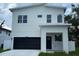 Modern two-story home with a two-car garage at 2404 Cassell St, Tampa, FL 33605
