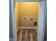A dedicated laundry area with modern flooring at 2404 Cassell St, Tampa, FL 33605
