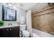 Cozy bathroom featuring a shower-tub combination, ceramic tile, and modern fixtures at 2690 Coral Landings Blvd # 122, Palm Harbor, FL 34684