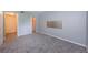 Comfortable bedroom featuring soft carpet and plenty of natural light at 2690 Coral Landings Blvd # 122, Palm Harbor, FL 34684