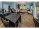 View of the resident business center featuring desks, seating, and a couch at 2690 Coral Landings Blvd # 122, Palm Harbor, FL 34684
