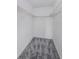 Walk-in closet featuring white walls and wire shelving for ample storage at 2690 Coral Landings Blvd # 122, Palm Harbor, FL 34684