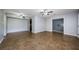 Wide angle shot of living room boasting tile floors, ceiling fans, and an open layout at 2690 Coral Landings Blvd # 122, Palm Harbor, FL 34684