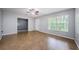 Inviting living room showcasing neutral walls, tile floors, and a window with natural light at 2690 Coral Landings Blvd # 122, Palm Harbor, FL 34684
