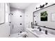 Modern bathroom with sleek fixtures, glass shower, and stylish design at 3011 1St N Ave, St Petersburg, FL 33713