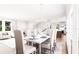 Open concept dining room next to living room and kitchen at 3011 1St N Ave, St Petersburg, FL 33713