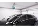 Clean, modern garage with two cars parked inside at 3011 1St N Ave, St Petersburg, FL 33713