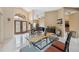 Open living and dining area featuring tile floors, high ceilings, and natural light at 3037 Crest Dr, Clearwater, FL 33759