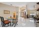 Bright living area with tile floors, neutral paint, and vaulted ceilings at 3037 Crest Dr, Clearwater, FL 33759