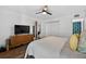 Spacious main bedroom featuring wood floors, ceiling fan, and ample closet space at 3325 Bayshore Blvd # A31, Tampa, FL 33629