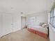 Bright bedroom offers carpet flooring, closet, and a window for lots of natural light at 3515 100Th N Ter, Pinellas Park, FL 33782