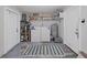 The laundry room features a new washer and dryer set with a shelf and white walls at 3515 100Th N Ter, Pinellas Park, FL 33782