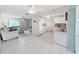 Living room view of the open floorplan to kitchen area at 3515 100Th N Ter, Pinellas Park, FL 33782