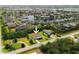 Aerial view highlights the property's location amidst lush greenery and waterways at 3614 Vasco St, Punta Gorda, FL 33950