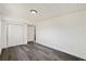Clean bedroom with neutral tones, wood flooring, and a spacious closet at 3614 Vasco St, Punta Gorda, FL 33950