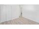 Bedroom featuring closet with light wood-look floors at 3617 E Louisiana Ave, Tampa, FL 33610