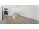 Bright living space with an open plan kitchen with an island and stainless steel appliances at 3617 E Louisiana Ave, Tampa, FL 33610
