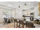 Kitchen with breakfast bar and granite counters in open floor plan at 3814 W Sevilla St, Tampa, FL 33629
