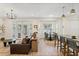 Spacious living area with ample windows, hardwood floors, and open layout at 3814 W Sevilla St, Tampa, FL 33629