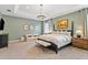 Spacious primary bedroom features a seating area, and ample natural light at 3814 W Sevilla St, Tampa, FL 33629
