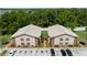 An aerial shot of a two-story apartment building, displaying its landscaping and parking at 4015 My Lady Ln # 7, Land O Lakes, FL 34638