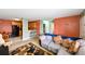 Inviting living room seamlessly transitions into the kitchen and dining area, creating an open and welcoming space at 4015 My Lady Ln # 7, Land O Lakes, FL 34638