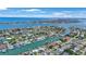 A stunning aerial view of a waterfront community, showcasing canals, beautiful homes, and easy access to the bay at 425 4Th N Ave, Tierra Verde, FL 33715