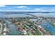 This aerial view features waterfront living, complemented by beautiful homes and easy access to nearby boating facilities at 425 4Th N Ave, Tierra Verde, FL 33715
