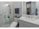 Modern bathroom with glass-enclosed shower, white vanity, and sleek fixtures, creating a spa-like atmosphere at 425 4Th N Ave, Tierra Verde, FL 33715