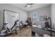 Bedroom features a desk, workout space, and bright window at 425 4Th N Ave, Tierra Verde, FL 33715