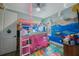 Fun bedroom with loft bed and colorful decor at 425 4Th N Ave, Tierra Verde, FL 33715