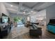 Bright living room boasting a coffered ceiling, hardwood floors, and direct access to the patio at 425 4Th N Ave, Tierra Verde, FL 33715