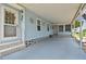 Spacious covered patio with ample seating area, perfect for outdoor enjoyment and entertaining at 427 Pelican S Dr, Oldsmar, FL 34677