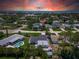 Aerial view showcasing the home's private pool, landscaped yard, and convenient access to the beach and coastal amenities at 4518 Helena Ne St, St Petersburg, FL 33703