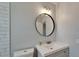 Bathroom features modern vanity and neutral wall color at 4518 Helena Ne St, St Petersburg, FL 33703