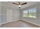 Bedroom showcases hardwood flooring and large window for ample natural light at 4518 Helena Ne St, St Petersburg, FL 33703