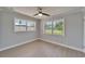 Bedroom features hardwood flooring, neutral walls, and window for ample natural light at 4518 Helena Ne St, St Petersburg, FL 33703