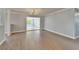 Bright dining room features wood floors, recessed lighting, and open access to other living areas at 4518 Helena Ne St, St Petersburg, FL 33703