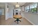 Bright eat-in kitchen features white cabinetry, stainless appliances, and a stylish backsplash at 4518 Helena Ne St, St Petersburg, FL 33703