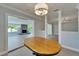 Open concept living space with a fireplace and views of the kitchen and dining areas at 4518 Helena Ne St, St Petersburg, FL 33703