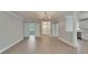 Open concept living space featuring wood floors and lots of natural light at 4518 Helena Ne St, St Petersburg, FL 33703