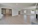 Bright and open living space featuring recessed lighting, wood floors, and access to the kitchen and entry way at 4518 Helena Ne St, St Petersburg, FL 33703