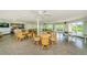 Spacious clubhouse features multiple tables and chairs, a billiards table, and a ping pong table at 4580 Overlook Ne Dr # 191, St Petersburg, FL 33703