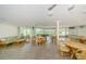 The expansive clubhouse offers a billiards table and a ping pong table with tables and chairs at 4580 Overlook Ne Dr # 191, St Petersburg, FL 33703