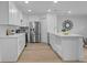 This kitchen showcases modern cabinets, stainless steel appliances, and a bright design at 4753 58Th N St, Kenneth City, FL 33709