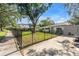 Modern home with a well-maintained front yard, featuring a manicured lawn and a welcoming exterior at 489 W Davis Blvd, Tampa, FL 33606