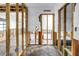 Open-concept living space showcasing wood framing and a view to other rooms at 489 W Davis Blvd, Tampa, FL 33606