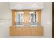 Elegant bathroom vanity with double sinks, stylish mirrors, and modern fixtures at 501 Brightwaters Ne Blvd, St Petersburg, FL 33704